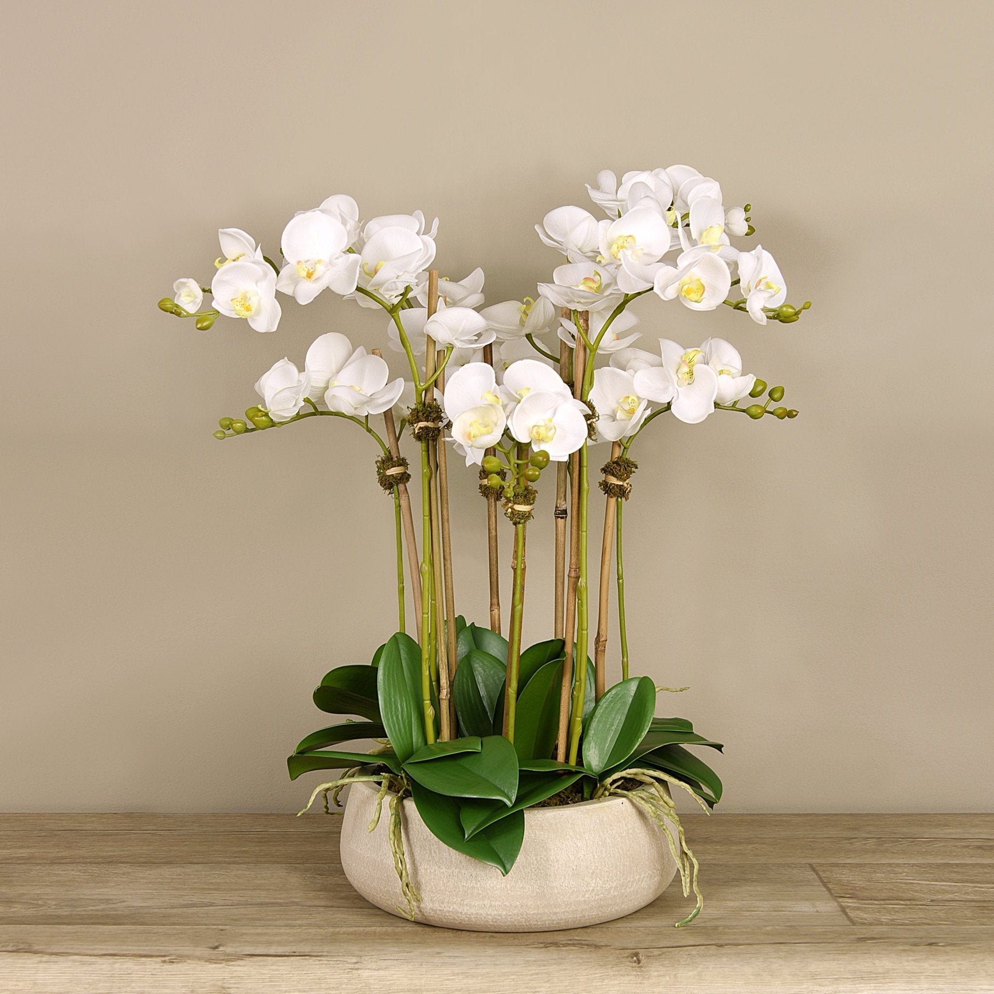 Artificial orchid centerpiece arrangement in beige planter - 28"