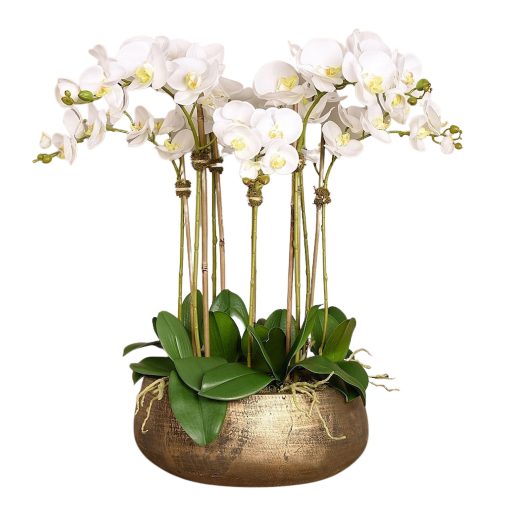 Faux white orchid arrangement in matte gold planter